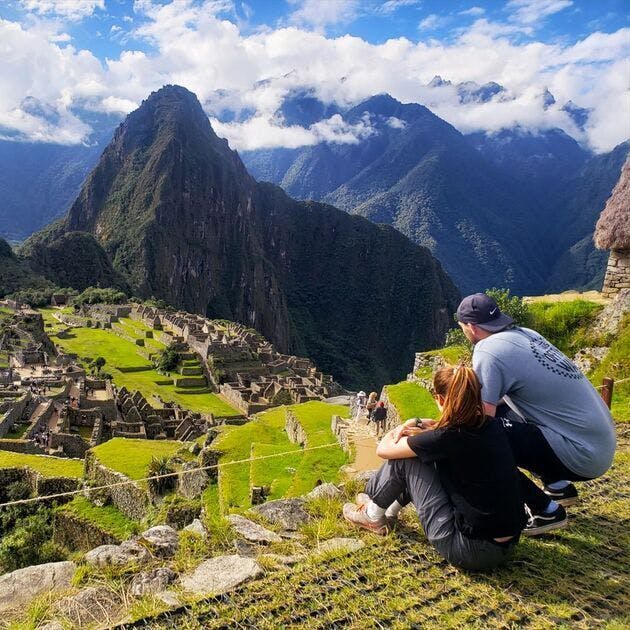 Tourist Enjoying Machu Picchu as a Couple
