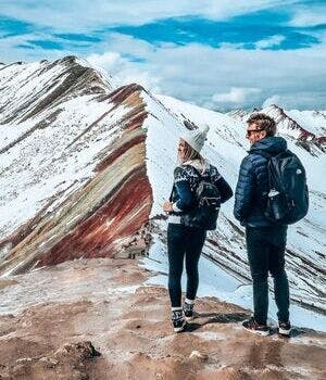 Visitors exploring the Montaña de Colores (Colored Mountain) in Cusc
